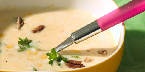 Spicy sweetcorn soup with pecan nuts